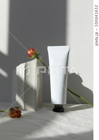 creative photo of nature and beauty products, flower and cream creative photo of nature and beauty products, flower and cream 100841632