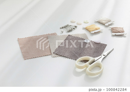 aesthetic photo of handmade, crafting hobbies, fabric sample and thread needle 100842284