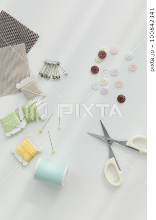 aesthetic photo of handmade, crafting hobbies, fabric samples and thread buttons 100842341