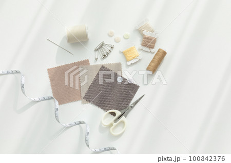 aesthetic photo of handmade, crafting hobbies, fabric sample and thread needle 100842376