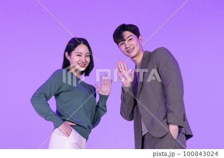 business working concept, young Korean Asian woman and man doing hand motion 100843024