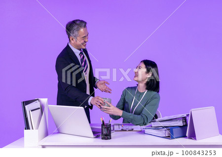 relationship and conflict between younger and older workers concept, Korean Asian young woman and manager level older man 100843253