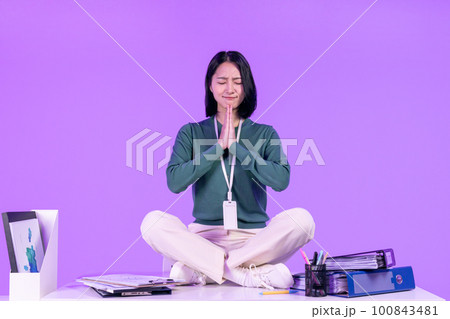 business working concept, young Korean Asian woman praying for miracle business working concept, young Korean Asian woman praying for miracle 100843481