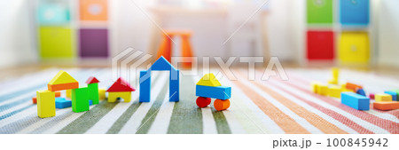 Panoramic background of the colourful blocks in playroom. Panoramic background of the colourful blocks in playroom. 100845942