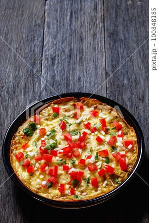 Green Chile Enchilada Casserole in baking dish 100848185