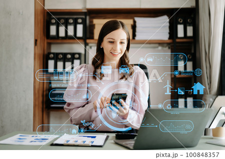 Business working with reduce CO2 concept with icons, global warming such as reforest green factory recycle and zero carbon dioxide emission concept. with VR icon at office. Business working with reduce CO2 concept with icons, global warming such as reforest green factory recycle and zero carbon dioxide emission concept. with VR icon at office. 100848357