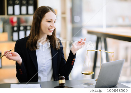 justice and law concept .Female judge in a courtroom on table and Counselor working in office. 100848509
