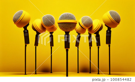 Retro microphone on yellow background 100854482
