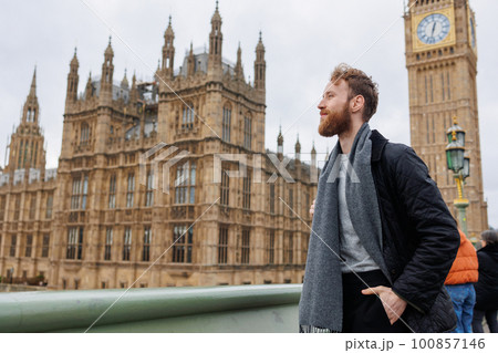 Male tourist in front of Big Ben in London Male tourist in front of Big Ben in London 100857146