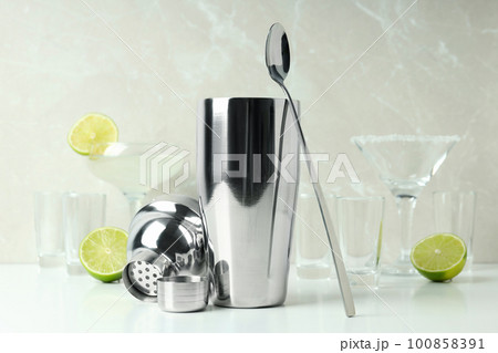 Concept of preparing alcohol drink or cocktail, shaker Concept of preparing alcohol drink or cocktail, shaker 100858391