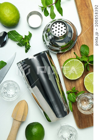 Concept of preparing cocktail, shaker, top view Concept of preparing cocktail, shaker, top view 100858392