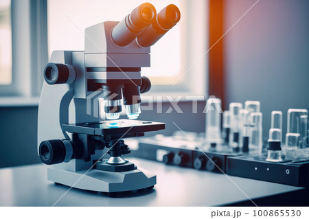 a microscope on your desk in a study or laboratory. 100865530