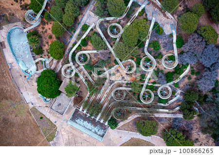 Aerial view of an abandoned old gloomy water park due to bankruptcy. Taken from a drone in summer 100866265