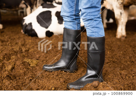Close up of black rubber boots Close up of black rubber boots 100869900
