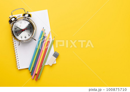 School supplies and stationery on yellow 100875710