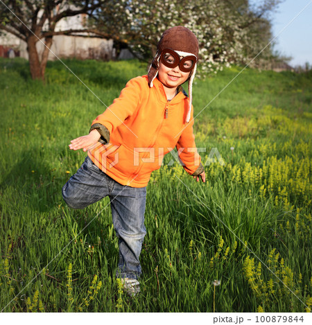 boy playing in the pilot boy playing in the pilot 100879844