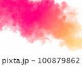 Orange and yellow  powder explosion on white background. Freeze motion of orange yellow  dust particles splash. 100879862