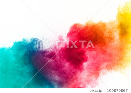 Yellow red and green dust explosion on white background. Red yellow and green powder splash. Yellow red and green dust explosion on white background. Red yellow and green powder splash. 100879867