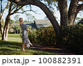 Retro styled woman having fun in the public park 100882391