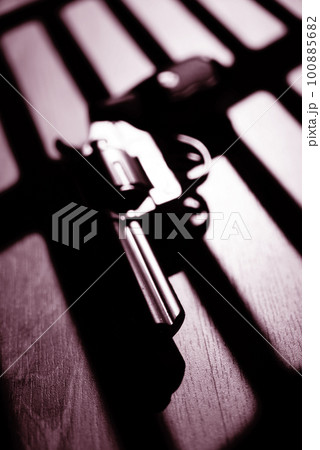 Pistol gun dark at night Pistol gun dark at night 100885682