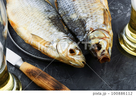 Dried salted fish for beer, stockfish 100886112