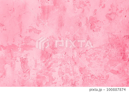Trendy color of the year 2023. Surface of old shabby wall with falling off plaster, toned in viva magenta color as background or texture Trendy color of the year 2023. Surface of old shabby wall with falling off plaster, toned in viva magenta color as background or texture 100887874