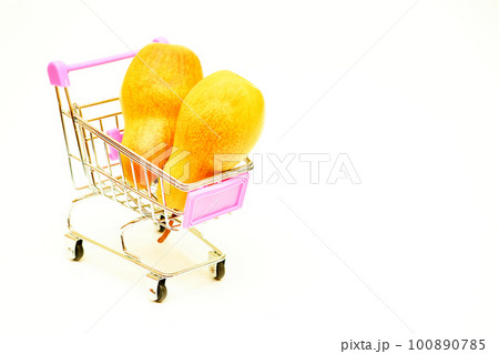 Metal shopping trolley in a supermarket store with two white ripe savory pears 100890785