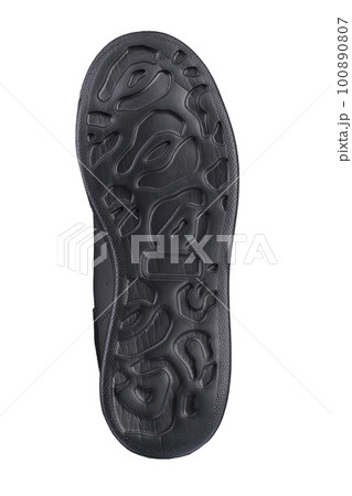 Black sole on a white background. Polyurethane sole Black sole on a white background. Polyurethane sole 100890807