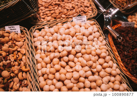 Macadamia nuts on the market. Spain one of the oldest market La Boqueria. Macadamia nuts on the market. Spain one of the oldest market La Boqueria. 100890877