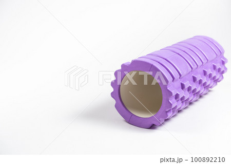 Massage roller, myofascial release. Sports equipment for self-massage of the muscles of the back and body. Massage roller, myofascial release. Sports equipment for self-massage of the muscles of the back and body. 100892210