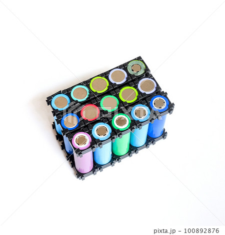 Reused Li ion 18650 battery pack in holder on white. Reused Li ion 18650 battery pack in holder on white. 100892876