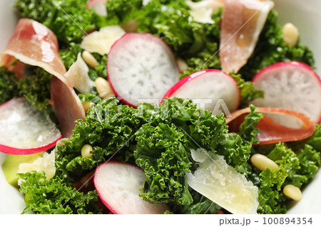 Tasty fresh kale salad as background, closeup Tasty fresh kale salad as background, closeup 100894354