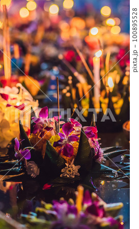 Loy Krathong festival, People buy flowers and candle to light and float on water to celebrate the Loy Krathong festival in Thailand 100895528