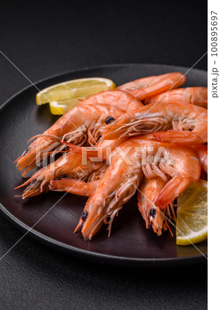 Tiger shrimp or langoustine boiled with spices and salt 100895697
