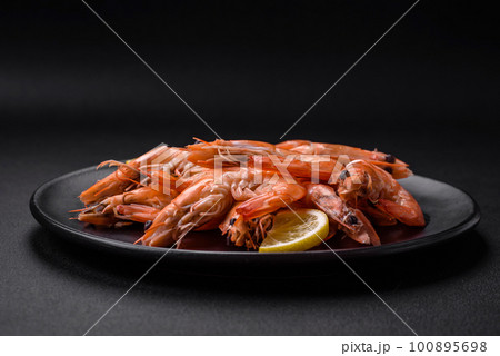Tiger shrimp or langoustine boiled with spices and salt 100895698