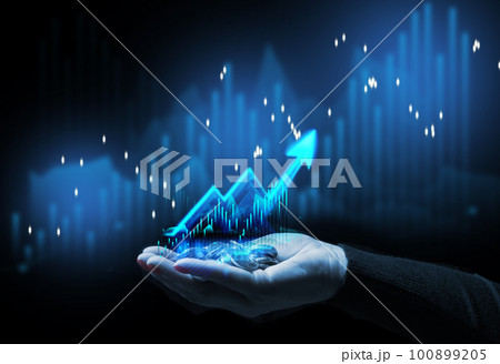 A woman's hand holds a stack of change against the background of a graph, the concept of cost growth, energy growth, profit loss 100899205