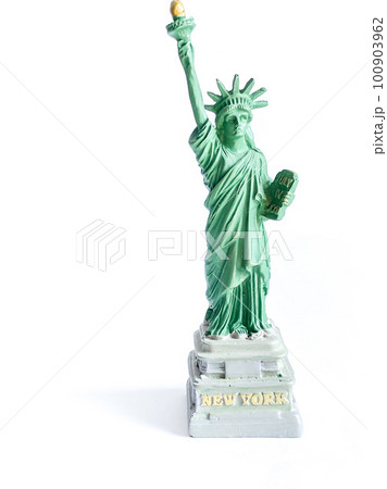 Small Liberty Statue souvenir on white background, a landmark of New York city Small Liberty Statue souvenir on white background, a landmark of New York city 100903962