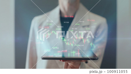 Woman hands with digital tablet pc computer and 3d hologram of futuristic finance stock exchange market chart. Bar graph with auto trading computer coding artificial intelligence technology, AI Woman hands with digital tablet pc computer and 3d hologram of futuristic finance stock exchange market chart. Bar graph with auto trading computer coding artificial intelligence technology, AI 100911055