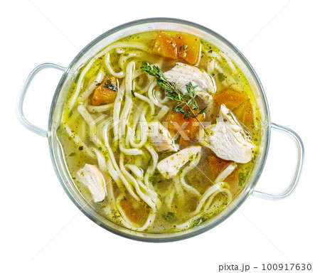 Boiled noodles with chicken in a saucepan above isolated 100917630