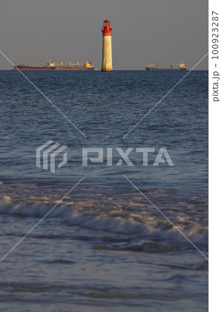 Phare de Chauvea near Ile de Re with ships to La Rochelle, Pays de la Loire, France Phare de Chauvea near Ile de Re with ships to La Rochelle, Pays de la Loire, France 100923287