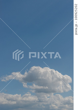 Cover page with soft blue sky with illuminated clouds as a background. 100925202