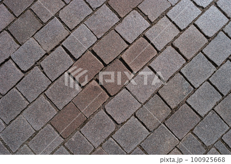 Pattern of ancient bricks and stones at old middle age pavement, as a background, closeup, details. Pattern of ancient bricks and stones at old middle age pavement, as a background, closeup, details. 100925668