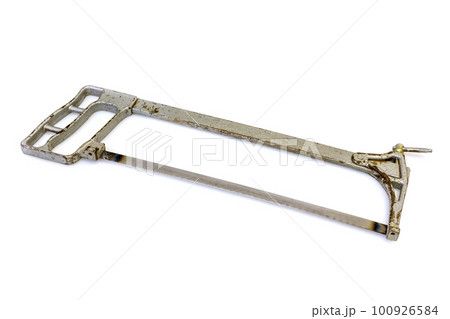 Silvery old hacksaw on a white background isolated 100926584