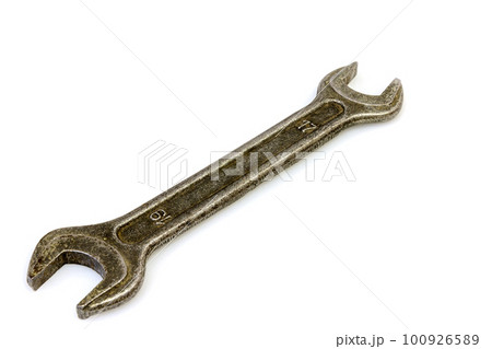 Horn metal old spanner on a white background Horn metal old spanner on a white background 100926589
