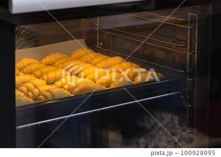 Croissants in Oven 100928095