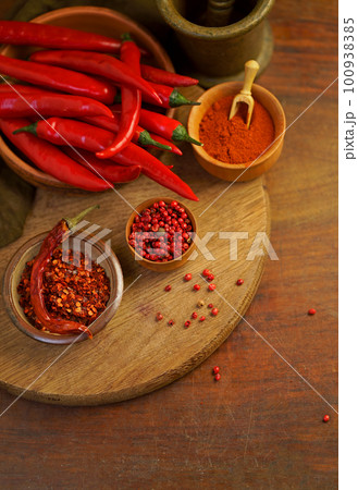 on old wooden table red hot chili peppers on old wooden table red hot chili peppers 100938385