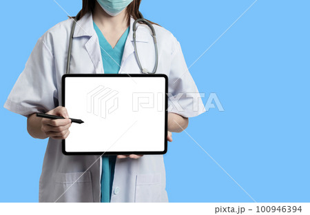 Doctor use tablet pc computer blank screen workspace isolated on background. Doctor use tablet pc computer blank screen workspace isolated on background. 100946394