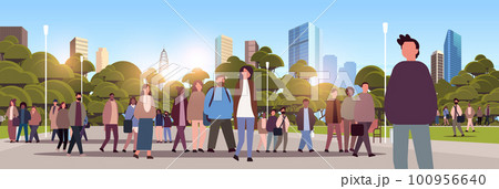 multiethnic people group walking outdoor mix race men women crowd spending time in urban park cityscape background 100956640