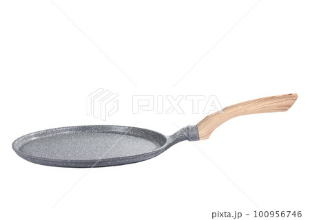 Round cast-iron pancake frying pan isolated on white. Round cast-iron pancake frying pan isolated on white. 100956746