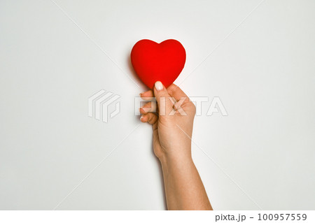 hands holding red heart, health care, love, organ donation, praying concept hands holding red heart, health care, love, organ donation, praying concept 100957559